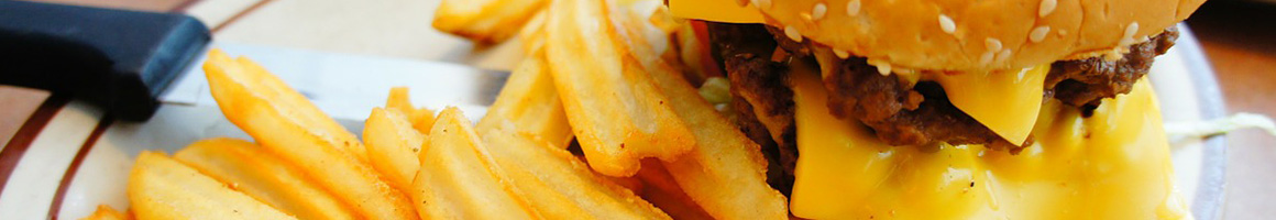Eating Burger at Tam's Burgers restaurant in Huntington Park, CA.